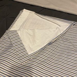 Two cotton striped curtain panels. 50”x106”